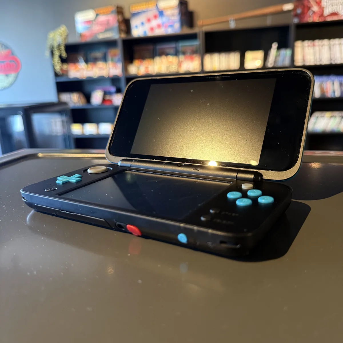 New Nintendo 2DS XL (Black + Turquoise) - Nintendo 3DS - Loose - NOSTOS Duluth GA